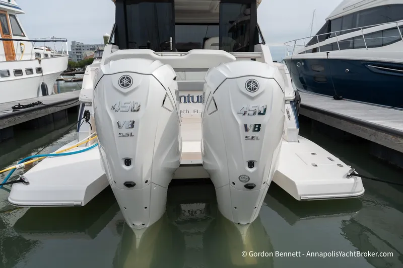 Qss Century Yacht Photos Pics 2024 Regal 36 XO boat with twin Yamaha 450 V8 engines docked at marina.