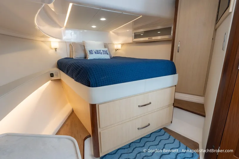 Qss Century Yacht Photos Pics 2024 Regal 36 XO yacht cabin with cozy bed and modern interior design.