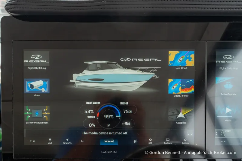 Qss Century Yacht Photos Pics 2024 Regal 36 XO yacht control panel displaying navigation and system information.