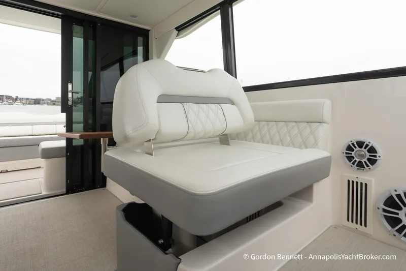 Qss Century Yacht Photos Pics Luxurious interior seating of 2024 Regal 36 XO yacht with elegant design.