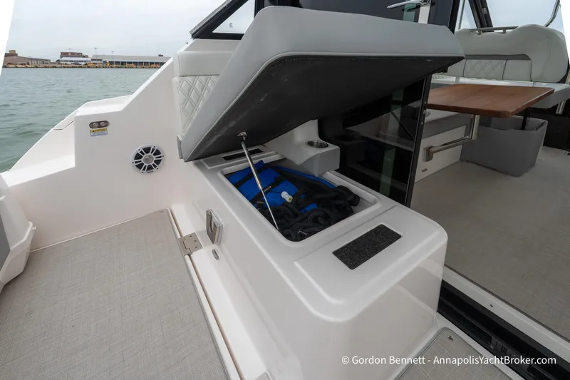 Qss Century Yacht Photos Pics 2024 Regal 36 XO yacht storage compartment open, revealing interior details.