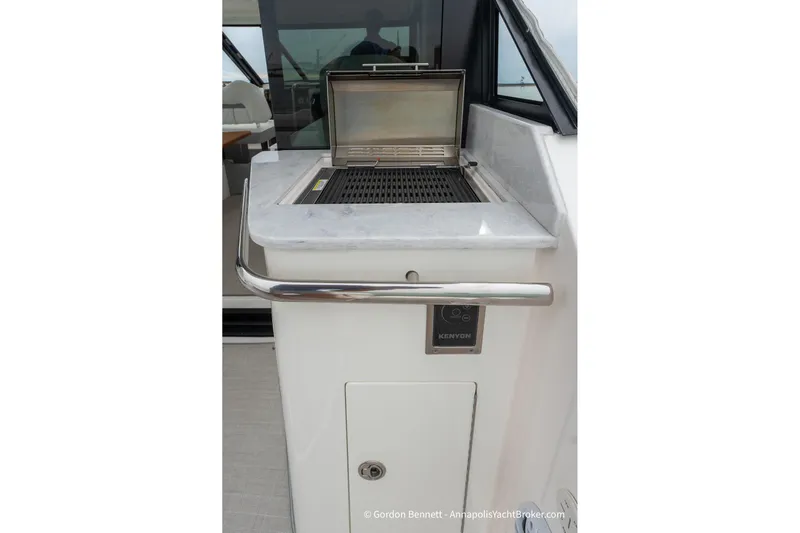 Qss Century Yacht Photos Pics Outdoor grill on 2024 Regal 36 XO yacht with sleek countertop design.