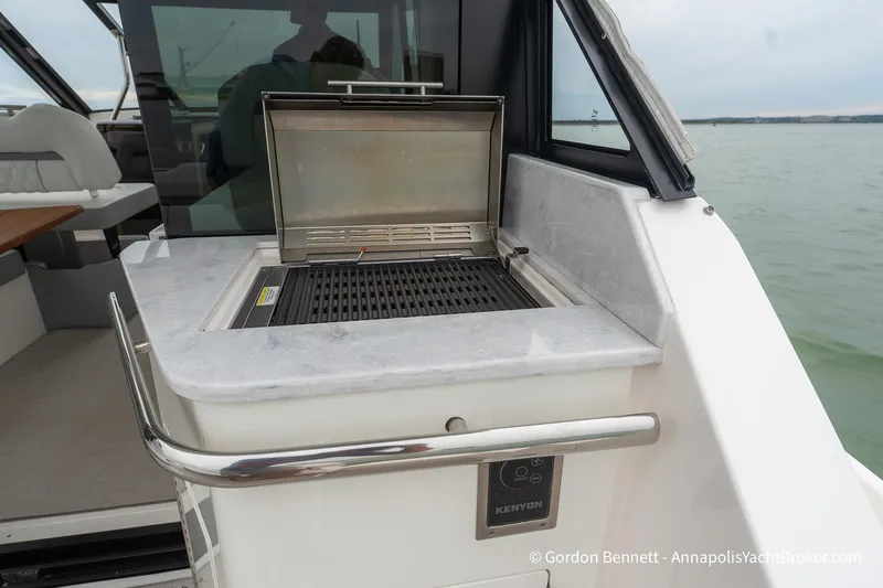 Qss Century Yacht Photos Pics 2024 Regal 36 XO yacht with built-in Kenyon grill on deck.