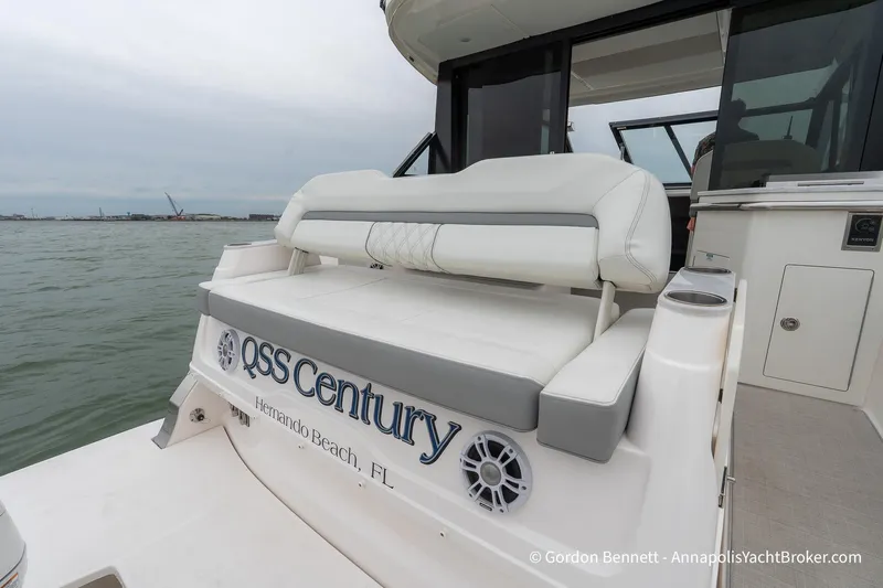 Qss Century Yacht Photos Pics 2024 Regal 36 XO yacht with cushioned seating, docked at Hernando Beach, FL.