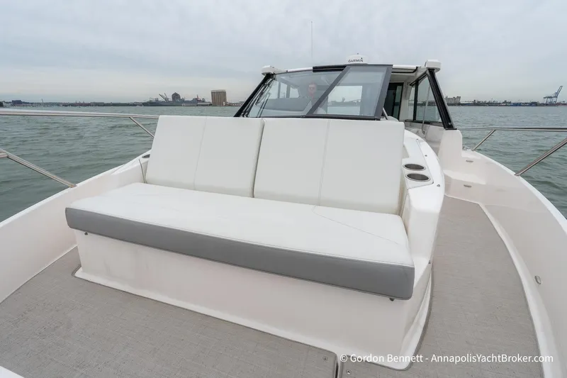 Qss Century Yacht Photos Pics 2024 Regal 36 XO yacht with spacious seating on deck, cruising on calm waters.