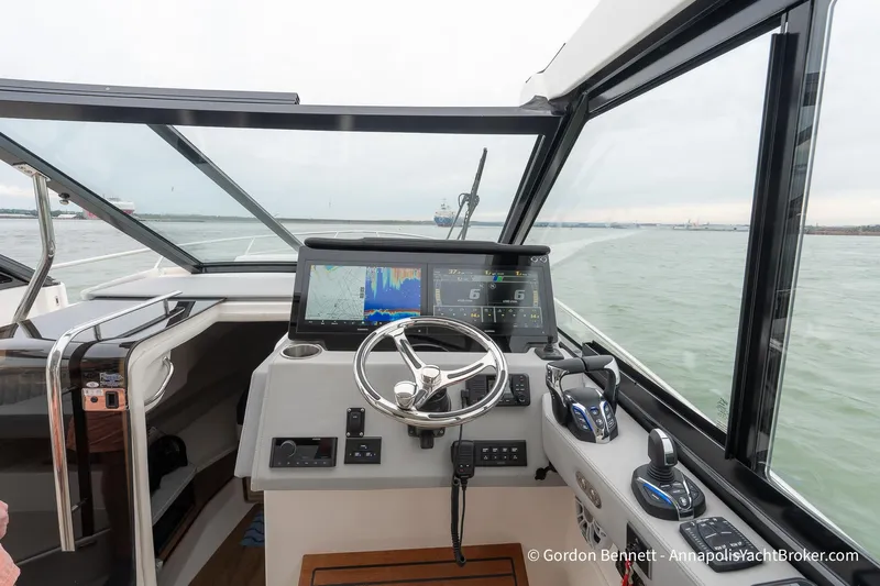 Qss Century Yacht Photos Pics 2024 Regal 36 XO yacht helm with advanced navigation system and panoramic water view.