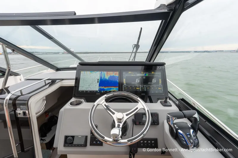 Qss Century Yacht Photos Pics 2024 Regal 36 XO yacht helm with advanced navigation displays and controls.