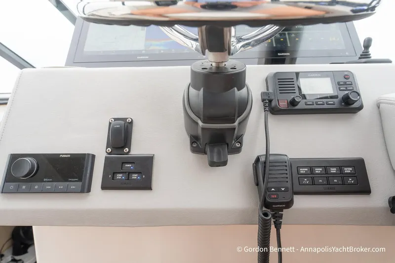 Qss Century Yacht Photos Pics 2024 Regal 36 XO yacht dashboard with Garmin and Fusion controls.