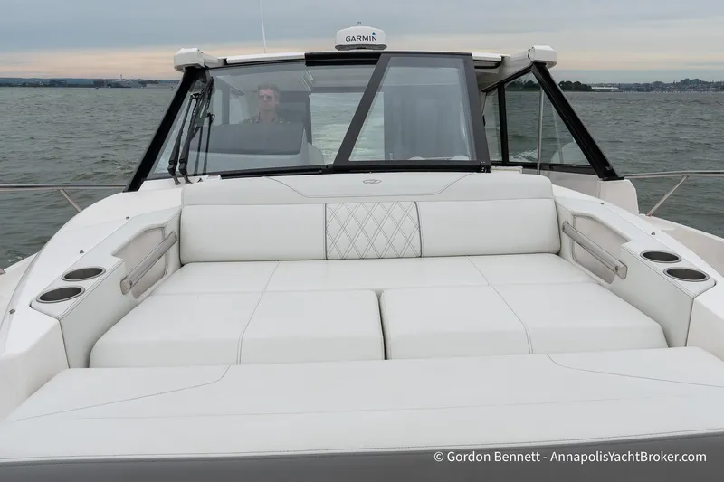 Qss Century Yacht Photos Pics 2024 Regal 36 XO yacht with spacious white seating on open water.