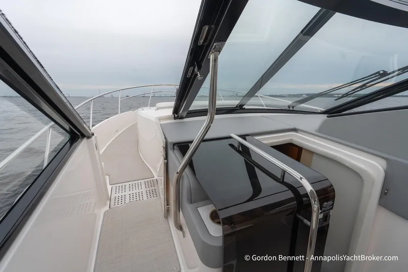 Qss Century Yacht Photos Pics 2024 Regal 36 XO yacht interior with sleek design and panoramic windows on open water.
