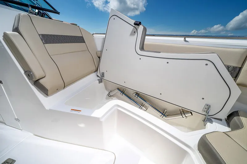  Yacht Photos Pics Manufacturer Provided Image: 2023 Pursuit DC 326 Dual Console boat with open storage compartment.