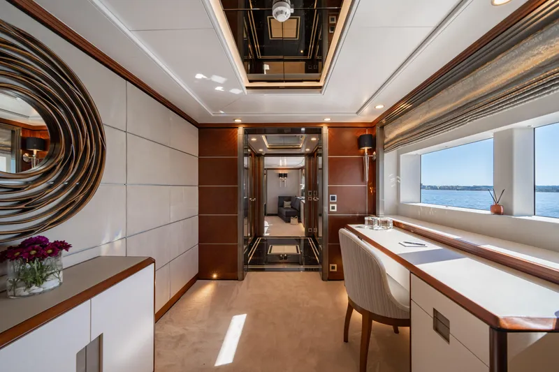 Titian Pearl Yacht Photos Pics Luxurious interior of 2001 CRN Magnifica 43 yacht with elegant decor and ocean view.