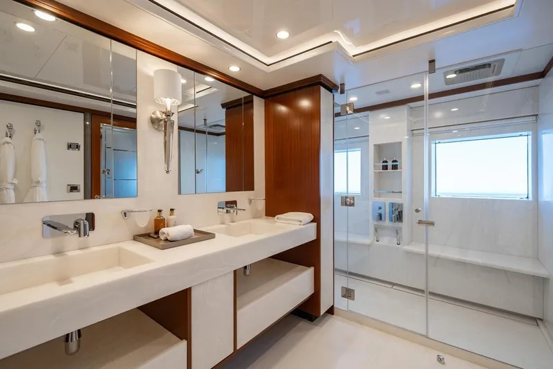 Titian Pearl Yacht Photos Pics Luxurious yacht bathroom with dual sinks and glass shower, CRN Magnifica 43, 2001 model.