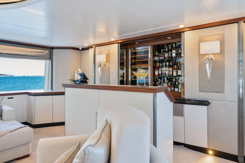 Titian Pearl Yacht Photos Pics Luxurious yacht interior with elegant bar, CRN Magnifica 43, 2001 model, ocean view.