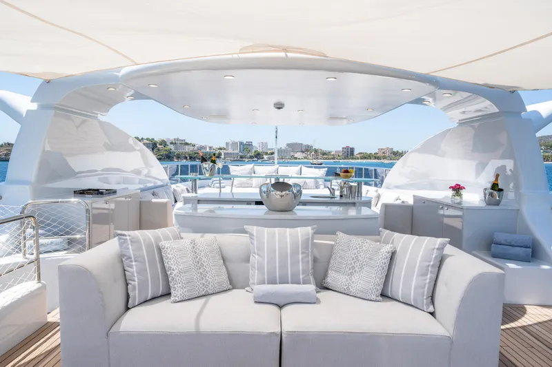 Titian Pearl Yacht Photos Pics Luxurious CRN Magnifica 43 yacht deck with elegant seating, ocean view, and modern amenities, 2001 model.