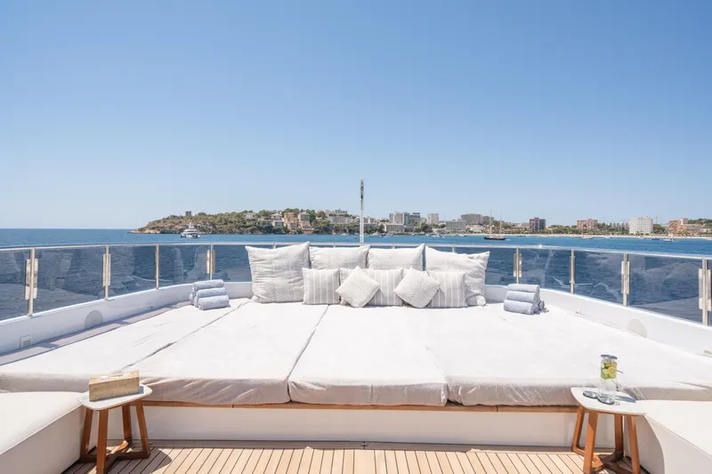 Titian Pearl Yacht Photos Pics Luxurious sun deck on 2001 CRN Magnifica 43 yacht with ocean view.