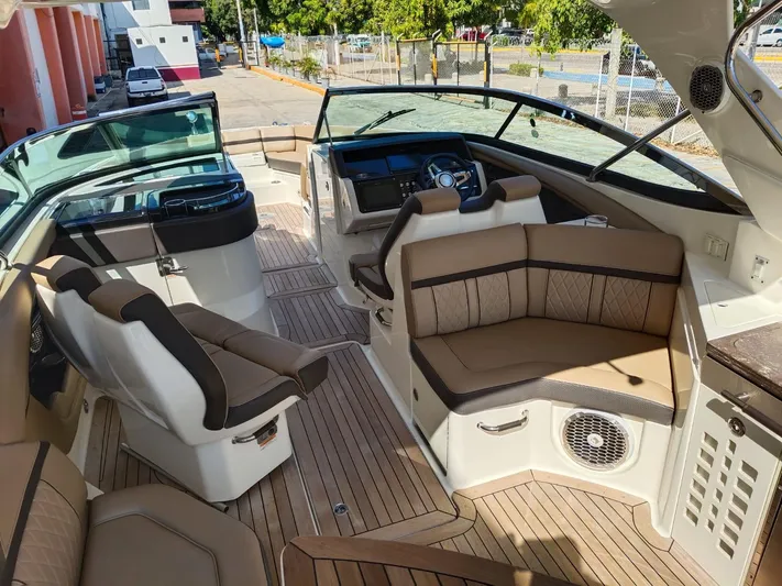 2018 Sea Ray 350 Slx @ Acapulco Yacht Photos Pics 2018 Sea Ray SLX 350 boat interior with luxurious seating and modern dashboard.