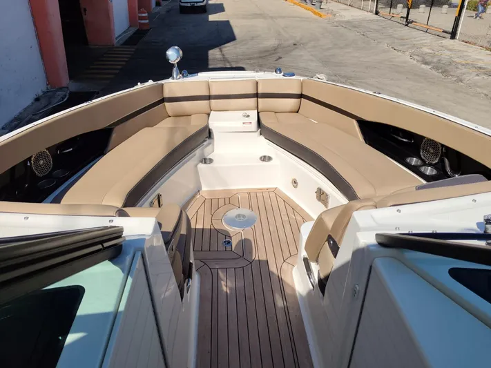 2018 Sea Ray 350 Slx @ Acapulco Yacht Photos Pics 2018 Sea Ray SLX 350 boat interior with tan seating and wooden deck.