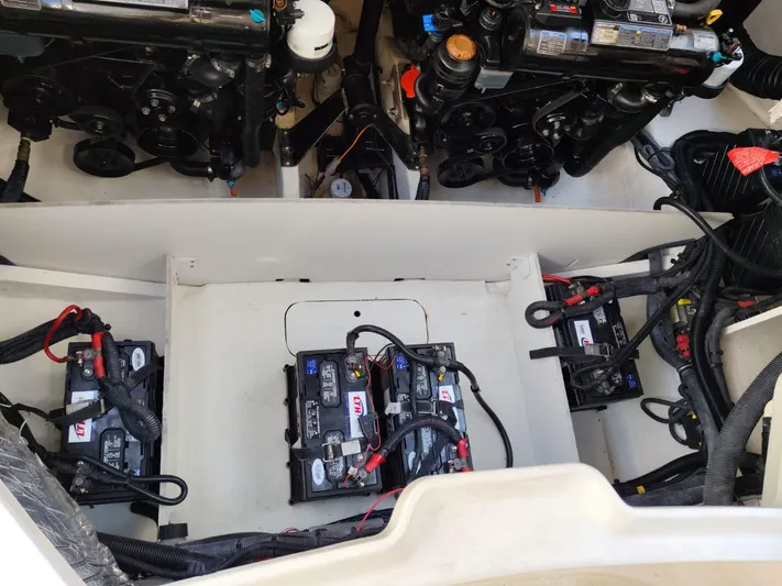 2018 Sea Ray 350 Slx @ Acapulco Yacht Photos Pics Engine compartment of 2018 Sea Ray SLX 350 with visible batteries and wiring.