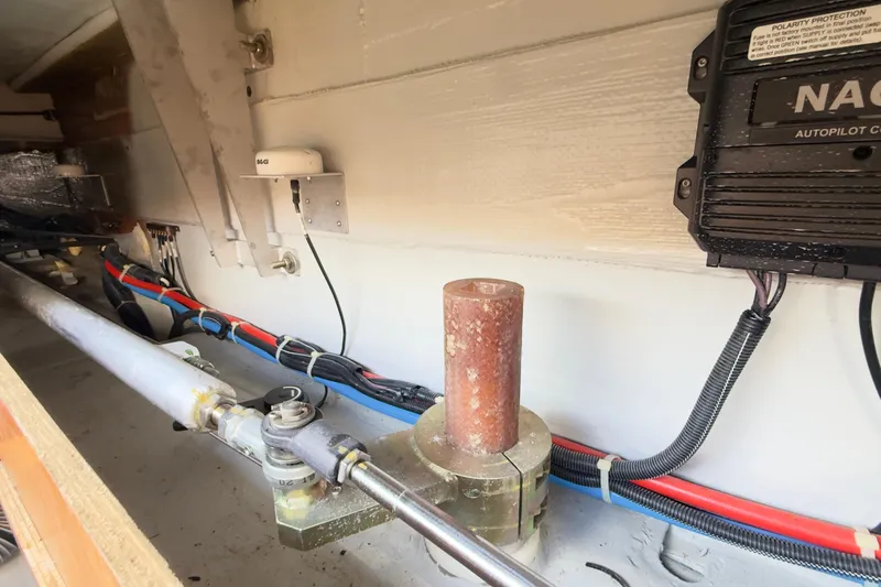 Carpediem 2 Yacht Photos Pics Interior view of a 2019 Lagoon 450 yacht showing wiring and autopilot system.