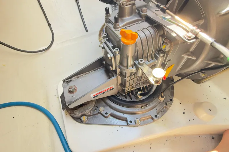 Carpediem 2 Yacht Photos Pics Yanmar engine component in a 2019 Lagoon 450 catamaran, showcasing mechanical details.