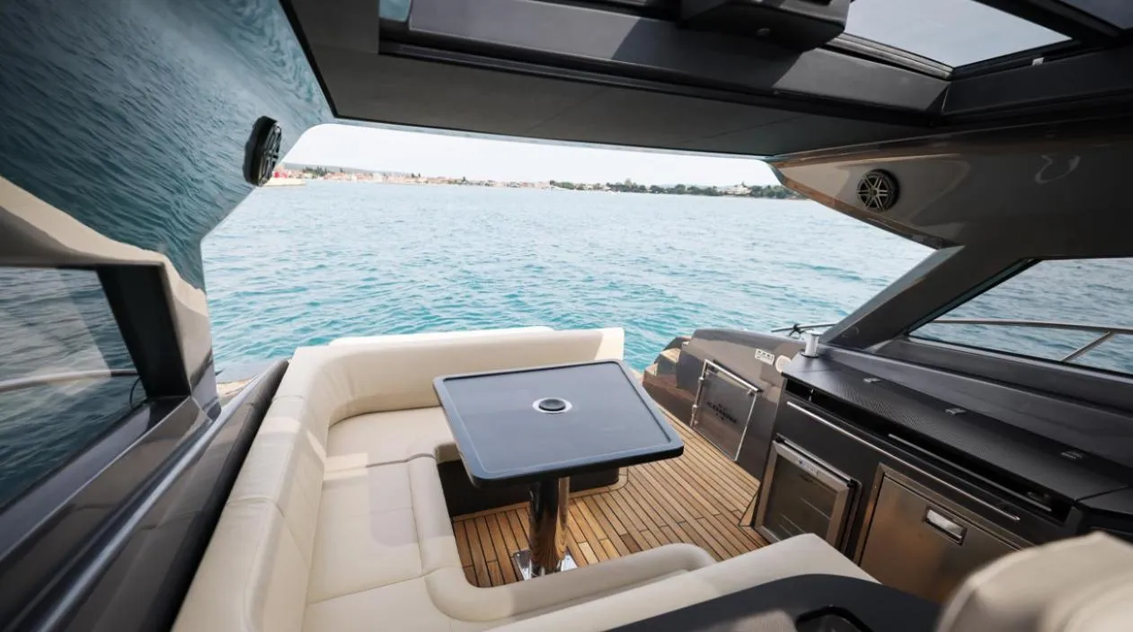 Luxurious 2026 Focus Power 44 yacht interior with seating and ocean view.
