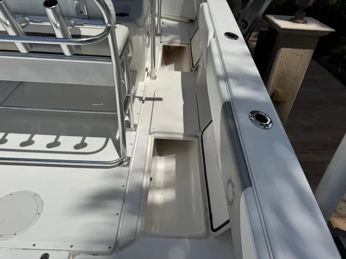  Yacht Photos Pics 2008 Fountain 34 Center Console boat interior with seating and storage compartments.