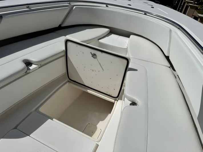  Yacht Photos Pics 2008 Fountain 34 Center Console boat with open storage compartment.