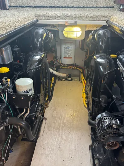 Psalm Waters Yacht Photos Pics Engine room of a 2012 Meridian 341 Sedan Bridge yacht, showcasing dual engines.