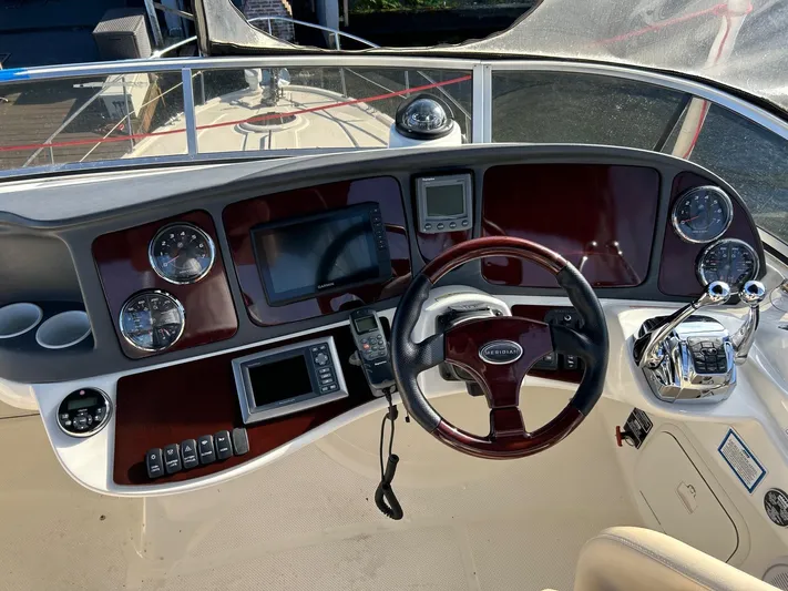 Psalm Waters Yacht Photos Pics Helm of 2012 Meridian 341 Sedan Bridge with modern navigation instruments and controls.