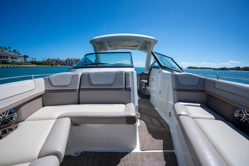 Knot Again Yacht Photos Pics 2018 Formula 350 Crossover Bowrider OB interior with luxurious seating and ocean view.