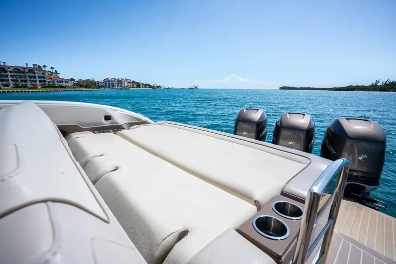 Knot Again Yacht Photos Pics 2018 Formula 350 Crossover Bowrider OB on water, showcasing luxurious seating and powerful engines.