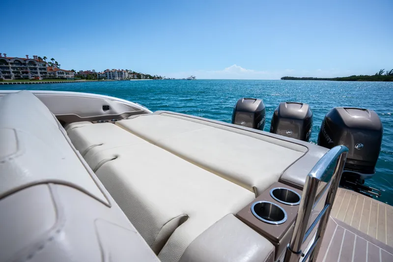 Knot Again Yacht Photos Pics 2018 Formula 350 Crossover Bowrider OB on water, showcasing luxurious seating and powerful outboard engines.