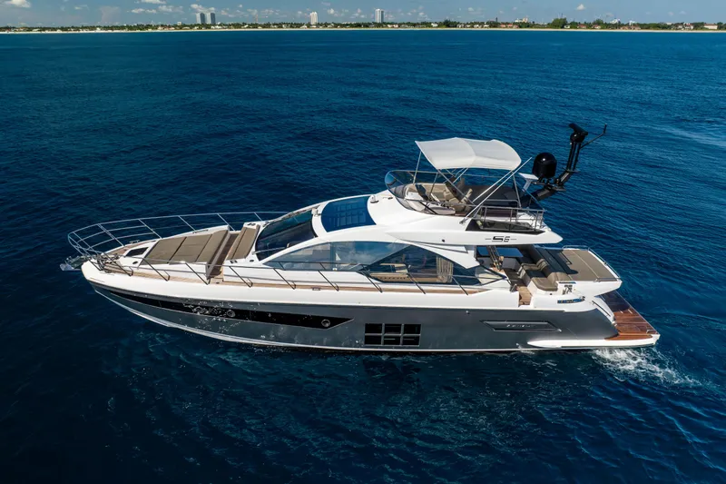  Yacht Photos Pics 2021 Azimut S6 Sportfly yacht cruising on open blue sea.