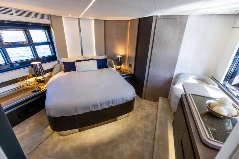  Yacht Photos Pics Luxurious bedroom interior of 2021 Azimut S6 Sportfly yacht with modern decor.