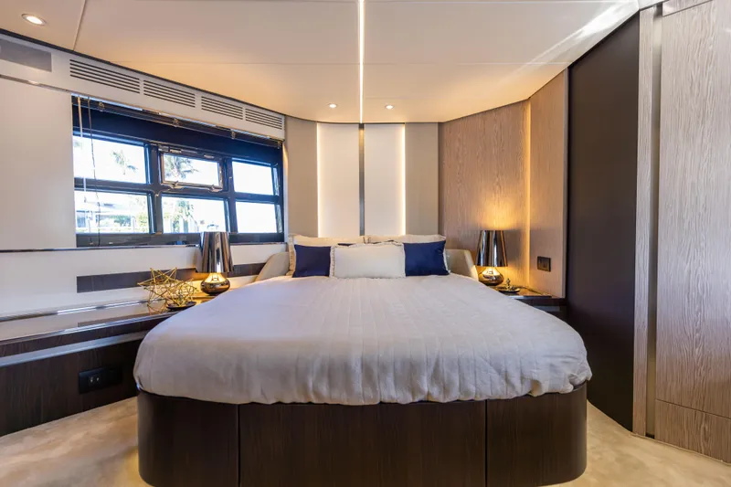  Yacht Photos Pics Luxurious bedroom interior of 2021 Azimut S6 Sportfly yacht with modern design elements.