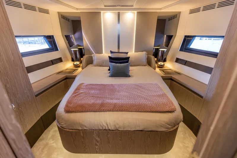  Yacht Photos Pics Luxurious bedroom interior of 2021 Azimut S6 Sportfly yacht with modern design and cozy bedding.