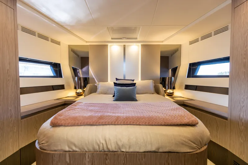  Yacht Photos Pics Luxurious bedroom interior of 2021 Azimut S6 Sportfly yacht with modern design and cozy bedding.