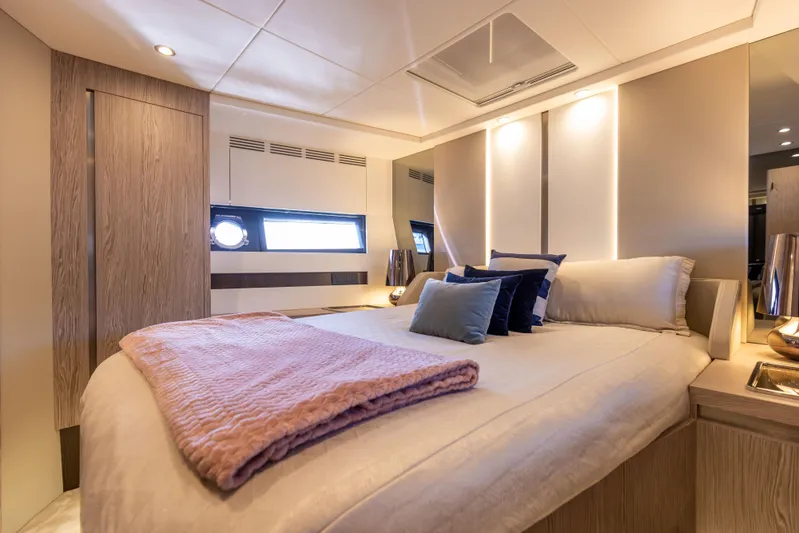  Yacht Photos Pics Luxurious bedroom interior of 2021 Azimut S6 Sportfly yacht with modern design and cozy bedding.
