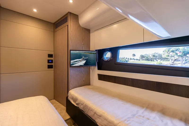  Yacht Photos Pics Luxurious interior of 2021 Azimut S6 Sportfly yacht cabin with scenic window view.