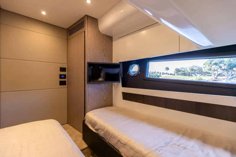  Yacht Photos Pics Luxurious interior of 2021 Azimut S6 Sportfly yacht cabin with modern design and window view.
