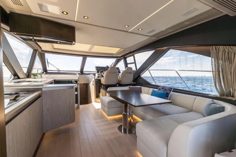  Yacht Photos Pics Luxurious interior of 2021 Azimut S6 Sportfly yacht with modern seating and ocean view.