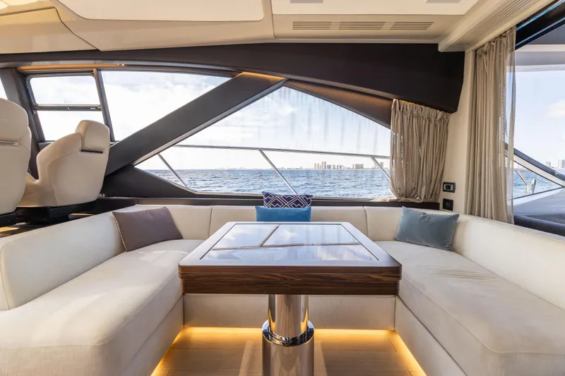  Yacht Photos Pics Luxurious interior of 2021 Azimut S6 Sportfly yacht with ocean view through large windows.
