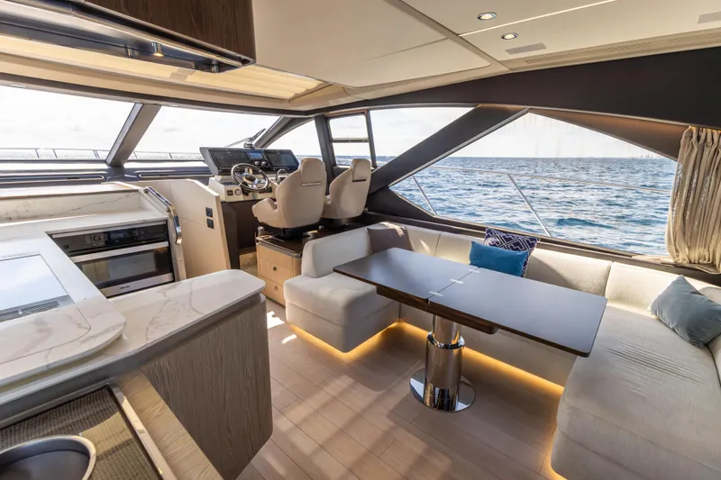  Yacht Photos Pics Luxurious interior of 2021 Azimut S6 Sportfly yacht with ocean view and modern furnishings.