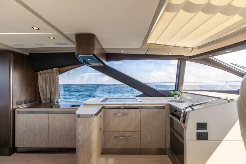  Yacht Photos Pics Luxurious interior of 2021 Azimut S6 Sportfly yacht with ocean view.