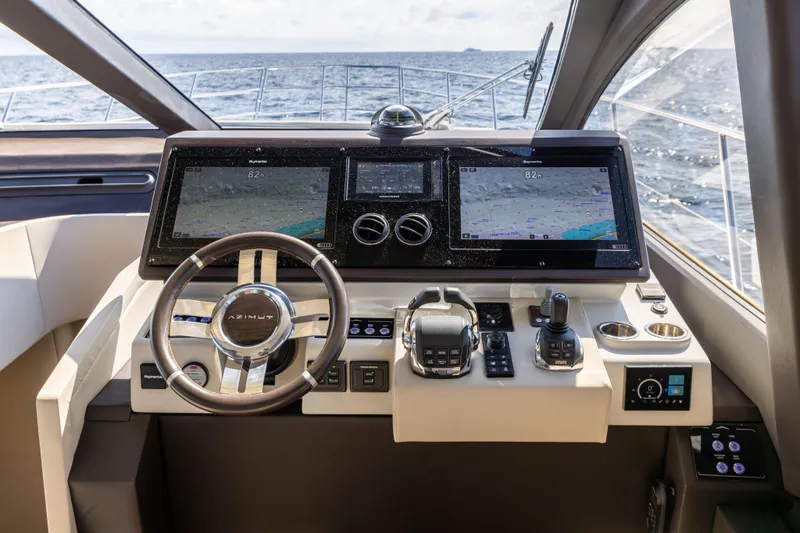  Yacht Photos Pics Cockpit of 2021 Azimut S6 Sportfly yacht with advanced navigation systems and controls.