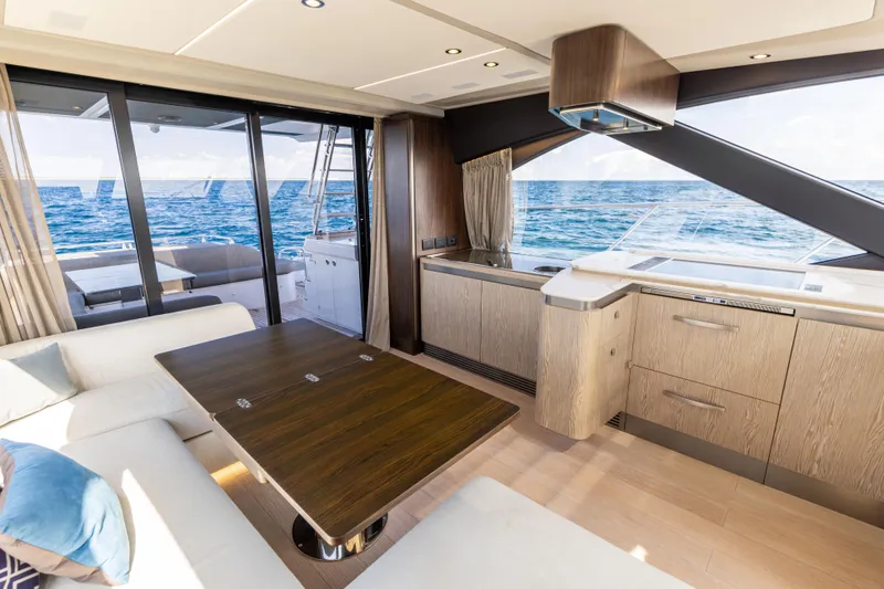  Yacht Photos Pics Luxurious interior of 2021 Azimut S6 Sportfly yacht with ocean view and modern furnishings.