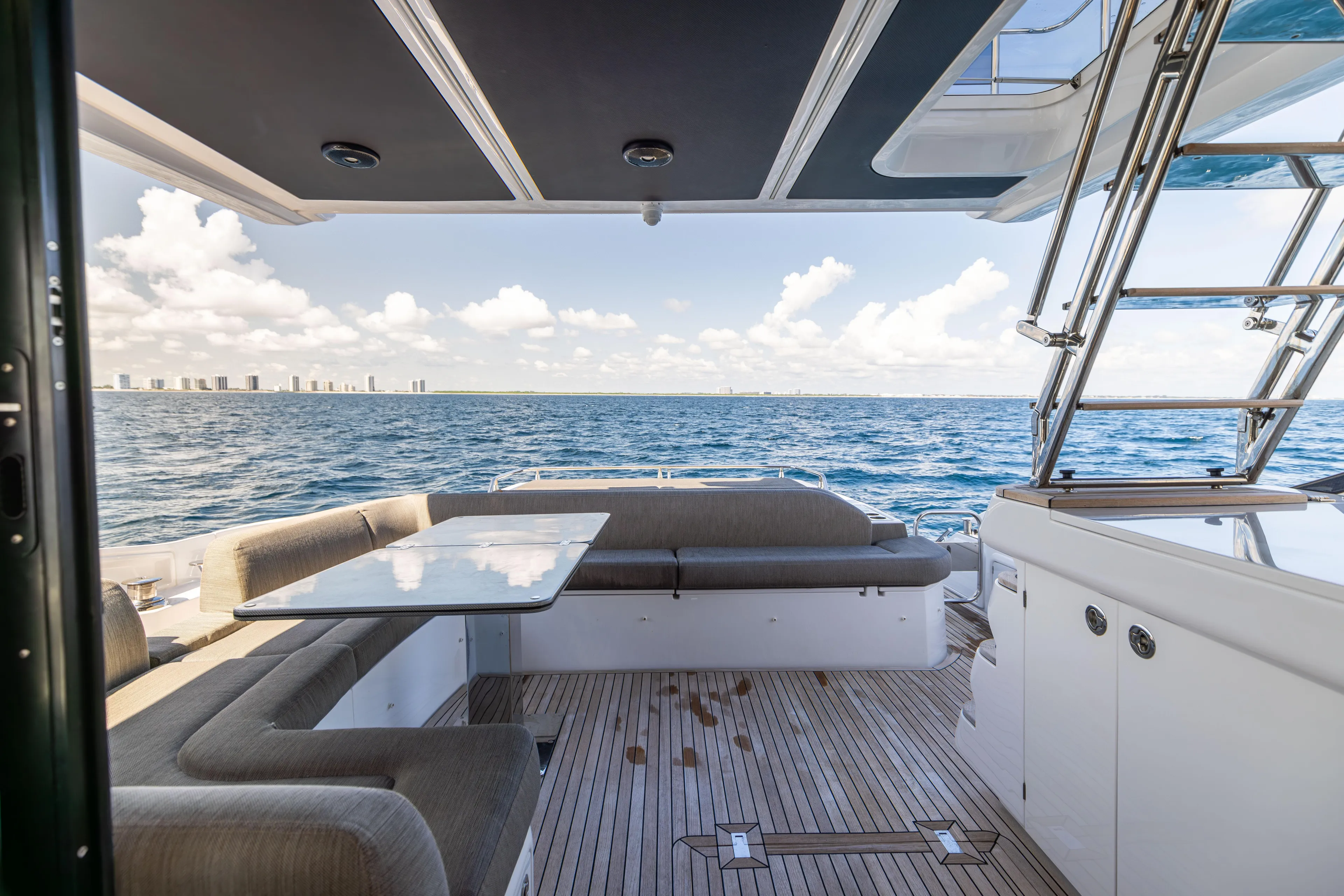  Yacht Photos Pics Luxurious 2021 Azimut S6 Sportfly yacht deck with ocean view and modern seating.