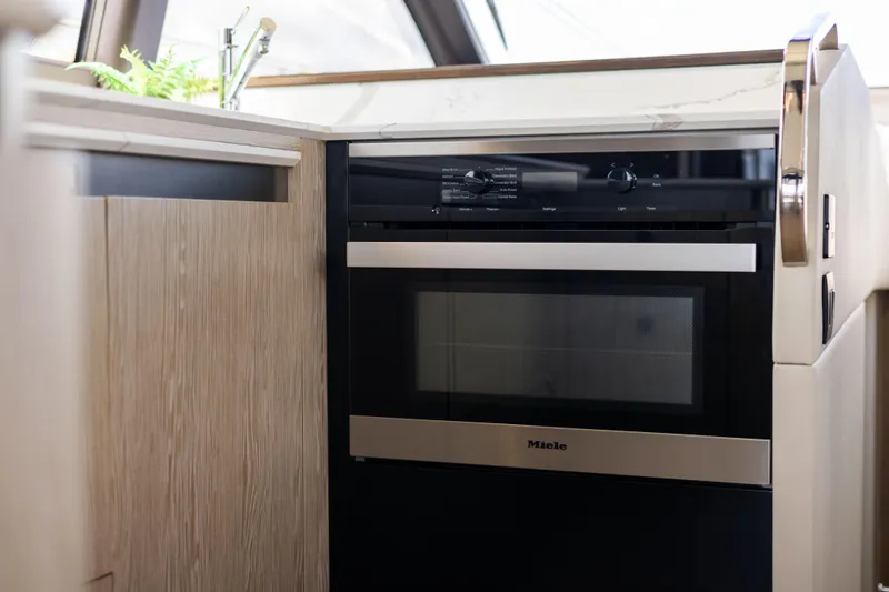  Yacht Photos Pics Modern kitchen with Miele oven in 2021 Azimut S6 Sportfly yacht.