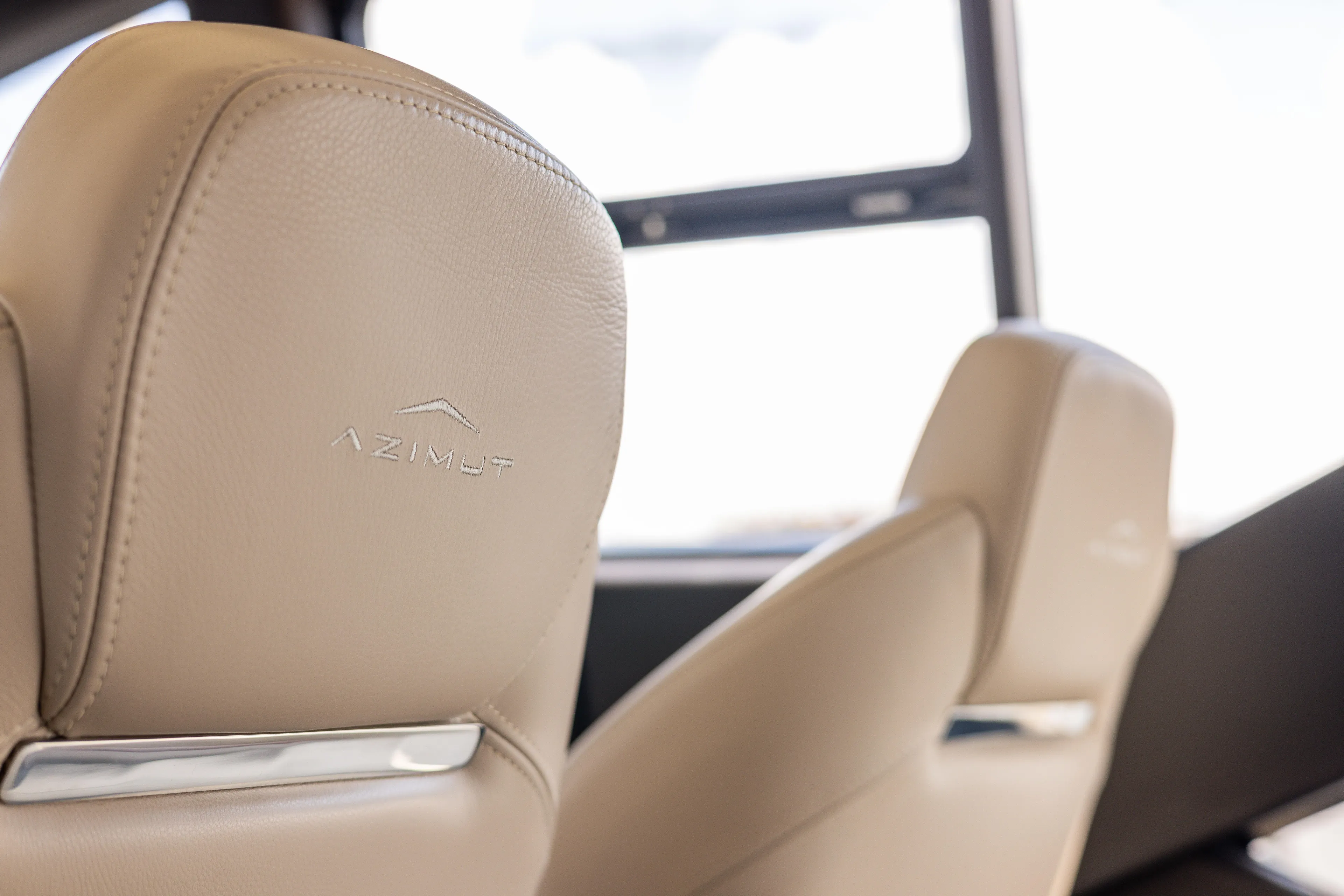  Yacht Photos Pics Luxurious beige leather seats in 2021 Azimut S6 Sportfly yacht interior.